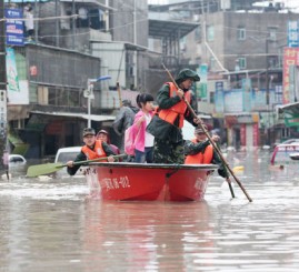 China: 55 dead, 14 missing in S China storms